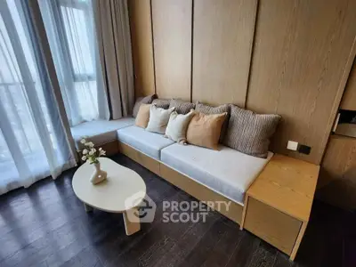 Stylish living room with cozy seating and elegant decor in modern apartment