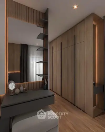 Modern bedroom with sleek wooden wardrobe and stylish vanity area
