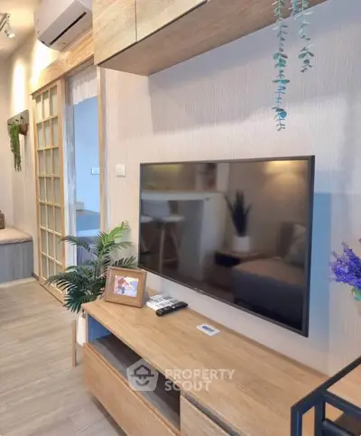 Modern living room with sleek TV setup and stylish decor