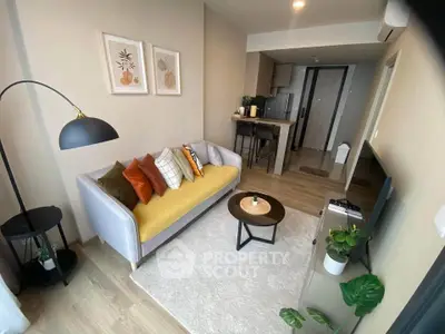 Modern living room with stylish decor and open kitchen layout