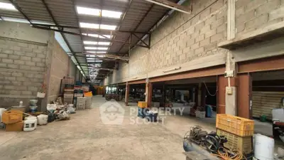 Spacious industrial warehouse with high ceilings and ample storage space