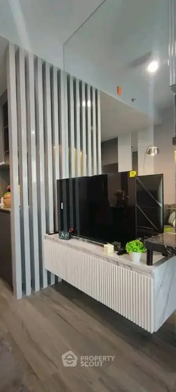 Modern living room with sleek TV stand and stylish decor