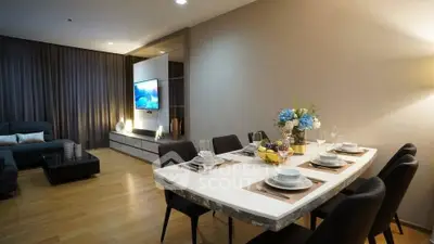 Modern living room with elegant dining area and stylish decor