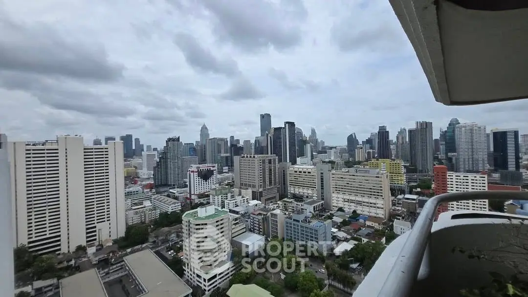 Stunning city skyline view from a high-rise balcony, perfect for urban living.