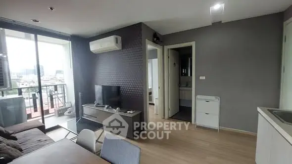 Modern living room with balcony view in stylish apartment