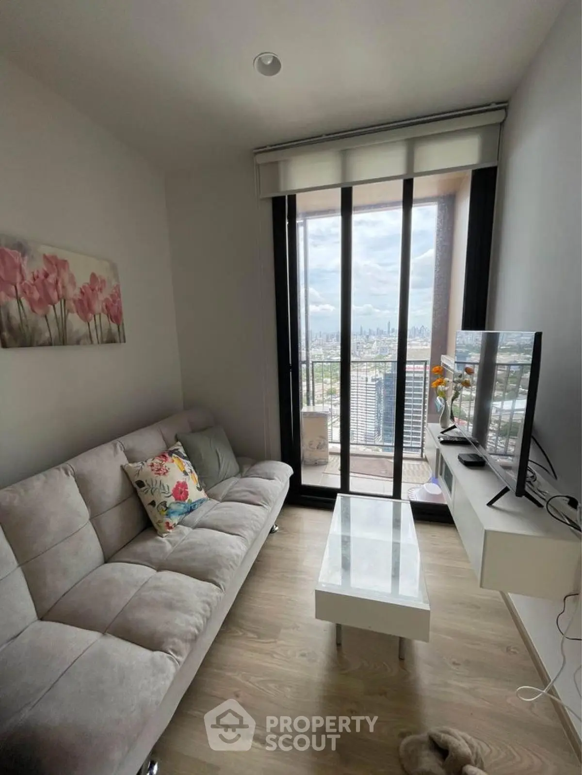 Modern living room with stunning city view and sleek decor