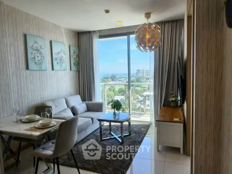 Chic living room with modern decor and stunning balcony view