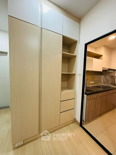 Modern kitchen with sleek cabinetry and open layout design