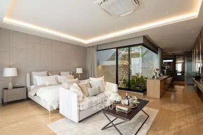 Luxurious bedroom with modern decor and spacious layout