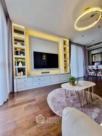 Luxurious living room with modern decor, elegant lighting, and stylish furniture in a contemporary apartment.
