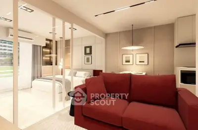 Modern living room with red sofa and glass partition leading to a cozy bedroom.