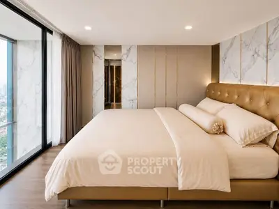 Luxurious bedroom with panoramic city view and elegant decor