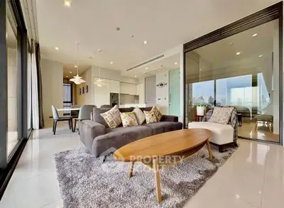 Spacious modern living room with open layout and city view, perfect for urban living.