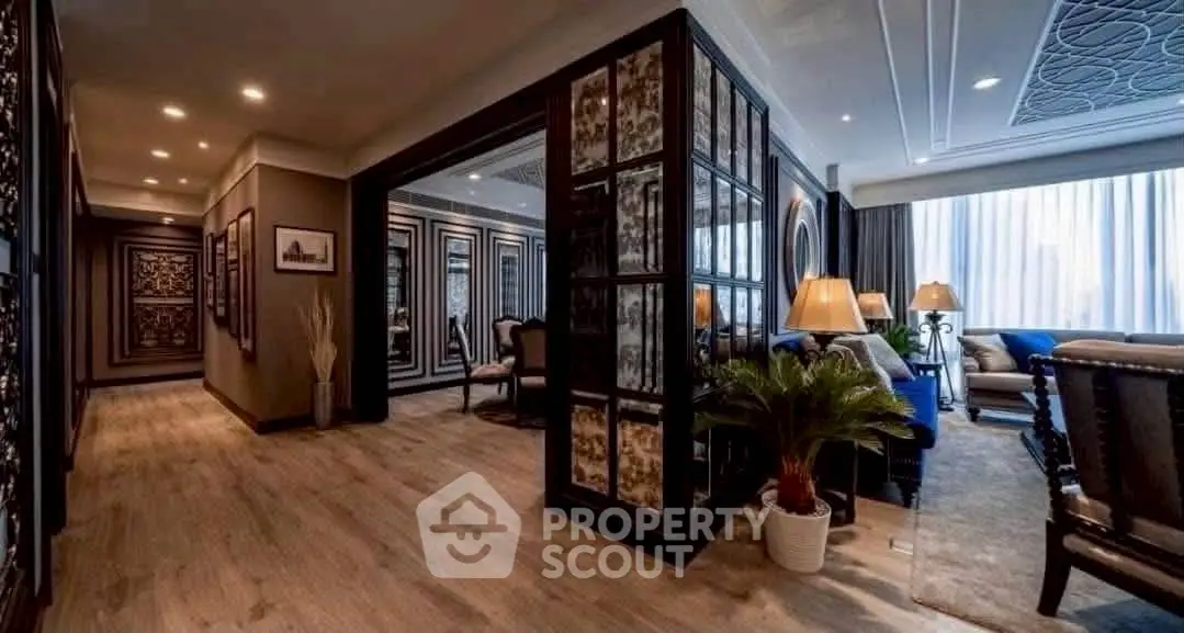 Luxurious living room with elegant decor and large windows for natural light.