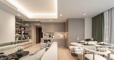 Modern open-plan living room and kitchen with elegant decor and ambient lighting.