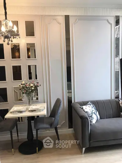 Elegant living room with chic decor and cozy seating area, perfect for modern urban living.