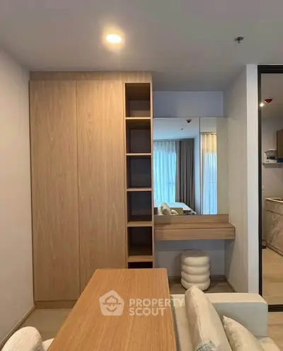 Modern apartment interior with stylish wooden furniture and cozy seating area