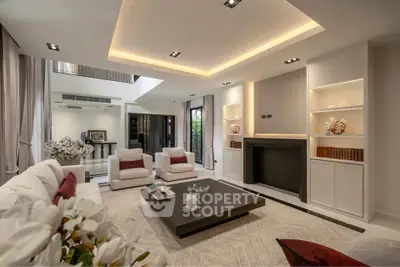Luxurious modern living room with elegant decor and ambient lighting.