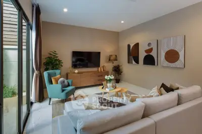 Stylish modern living room with elegant decor and large window view.