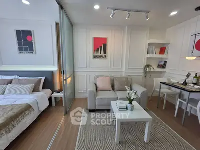 Modern studio apartment with stylish decor and cozy living area