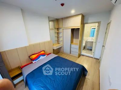 Modern bedroom with ensuite bathroom and built-in wardrobe