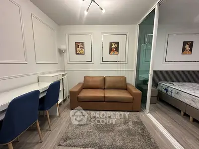 Modern studio apartment with stylish decor and cozy furnishings
