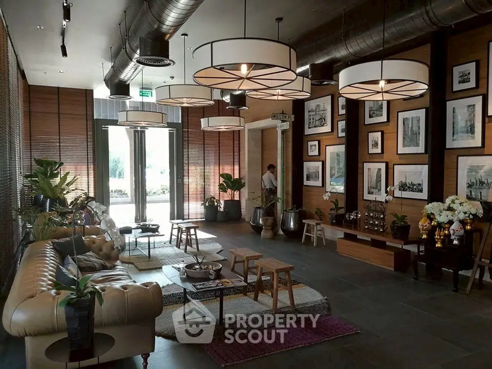 Luxurious living room with stylish decor and ample natural light.