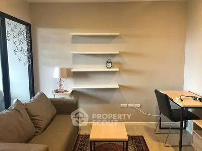 Modern living room with stylish shelving and cozy seating area