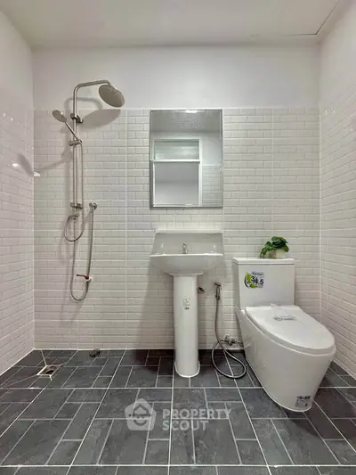 Modern bathroom with sleek fixtures and stylish tile design