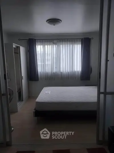 Cozy bedroom with natural light and minimalist design