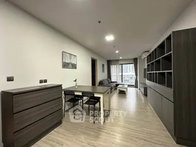 Spacious modern living room with sleek furniture and natural light