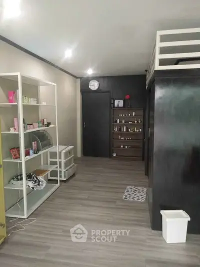 Modern interior with sleek shelving and minimalist design, perfect for urban living.