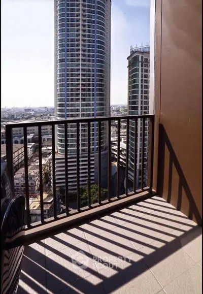Stunning high-rise balcony view with modern cityscape and skyscrapers, perfect for urban living enthusiasts.