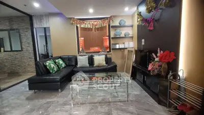 Stylish living room with modern decor and glass coffee table