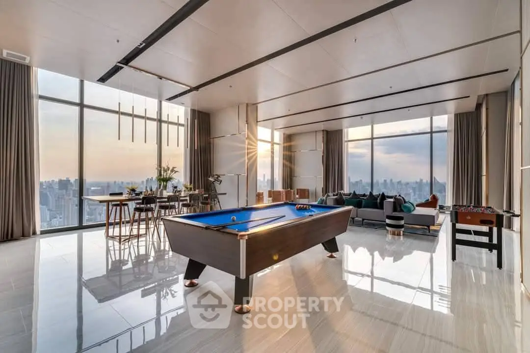 Luxurious penthouse with panoramic city views and elegant interior design.