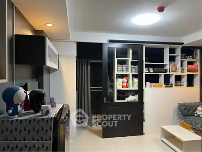 Modern living room with sliding door and stylish shelving