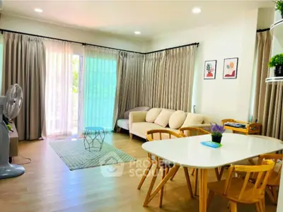 Spacious and bright living room with modern decor and natural light