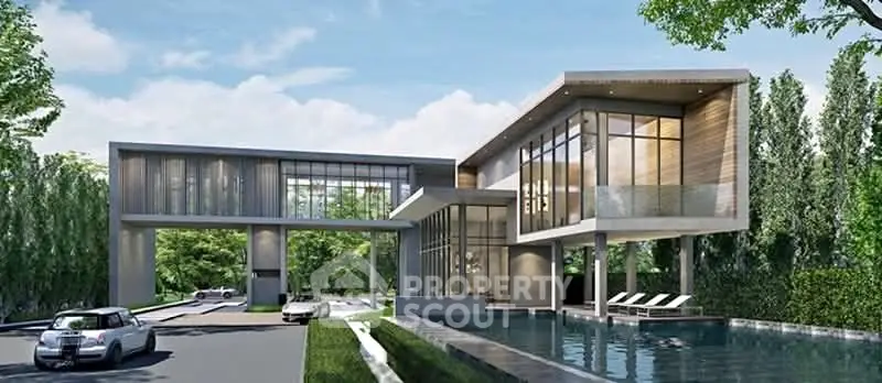 Modern luxury home with sleek architecture and private pool in lush green setting.