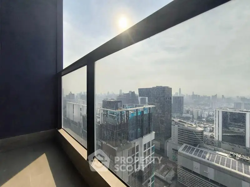Stunning cityscape view from a modern high-rise balcony, perfect for urban living.