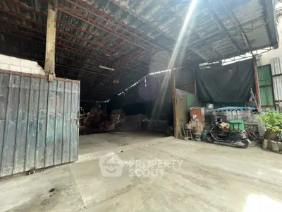 Spacious industrial warehouse with open layout and ample storage space