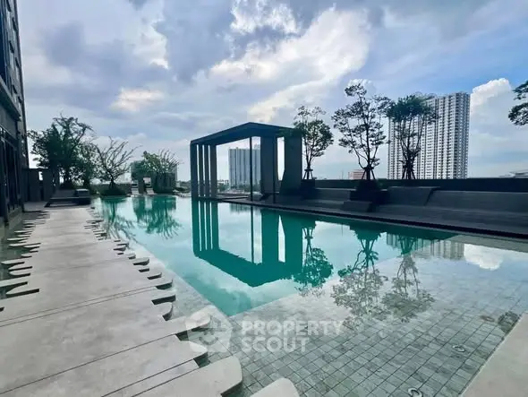 Luxurious rooftop pool with stunning city views and modern design elements.