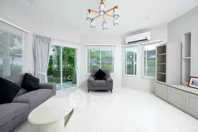 Bright and modern living room with large windows and stylish furniture