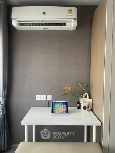 Modern study nook with air conditioning and stylish decor