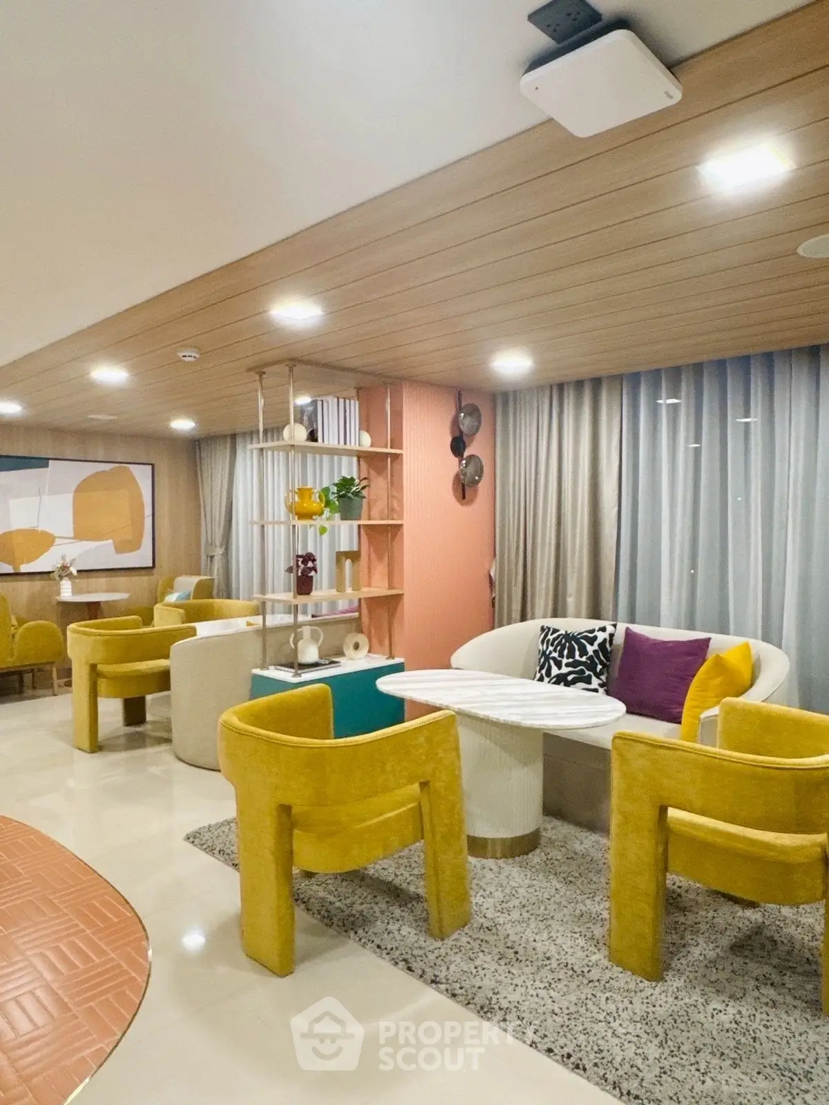 Stylish modern living room with vibrant furniture and elegant decor