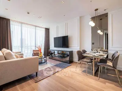 Luxurious modern living room with elegant dining area and large TV, featuring floor-to-ceiling windows and stylish decor.