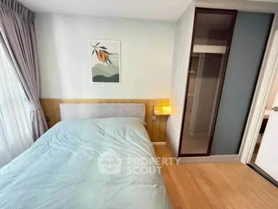 Modern bedroom with stylish decor and built-in wardrobe