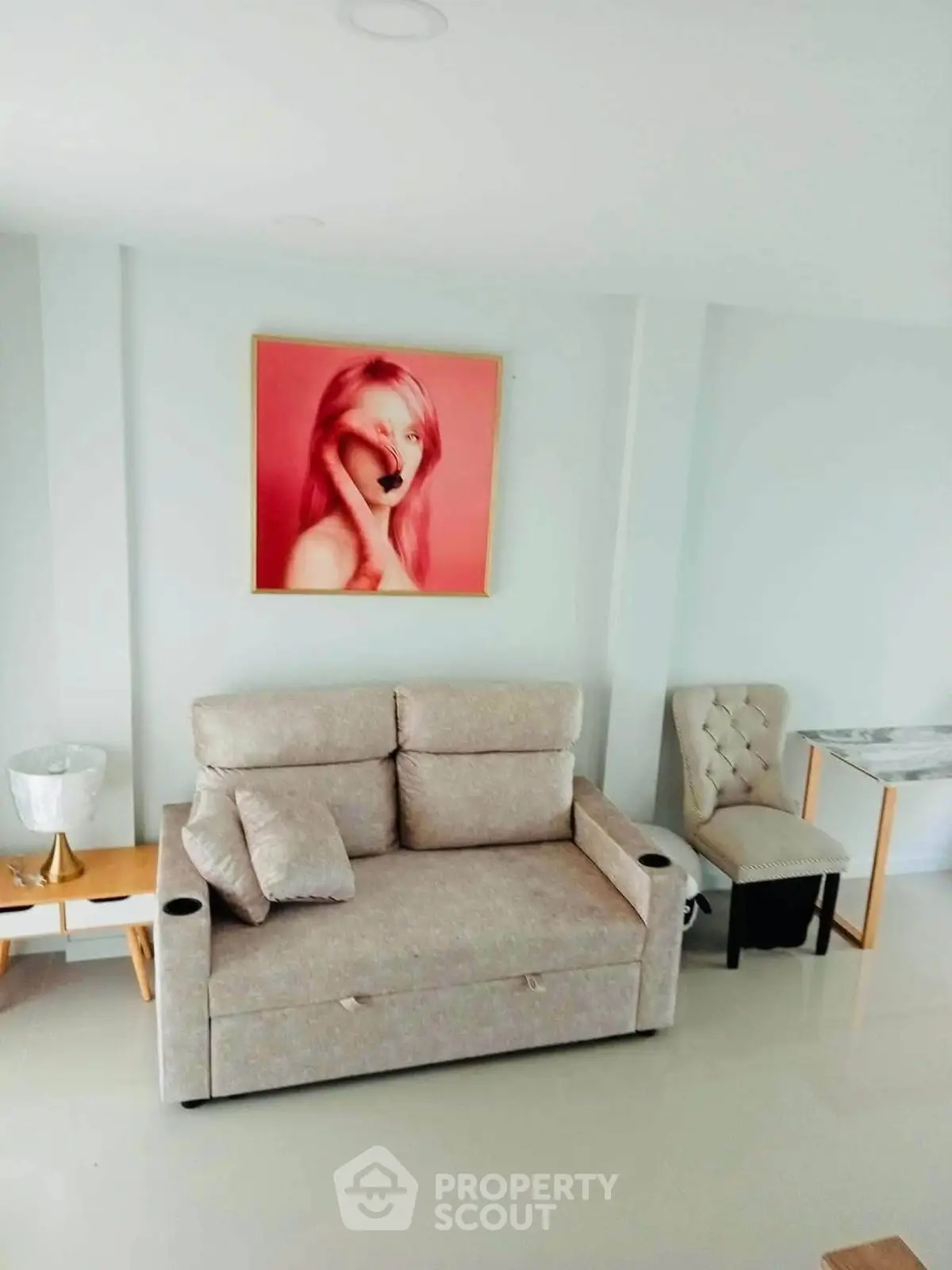 Chic living room with modern sofa and stylish decor, perfect for cozy relaxation.