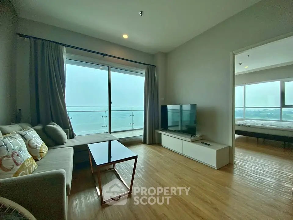 Spacious living room with stunning sea view and modern furnishings
