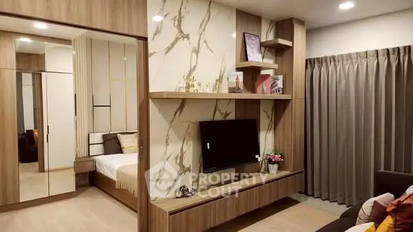 Modern living room with stylish wood paneling and built-in TV unit