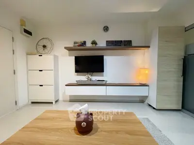 Modern living room with sleek furniture and ambient lighting